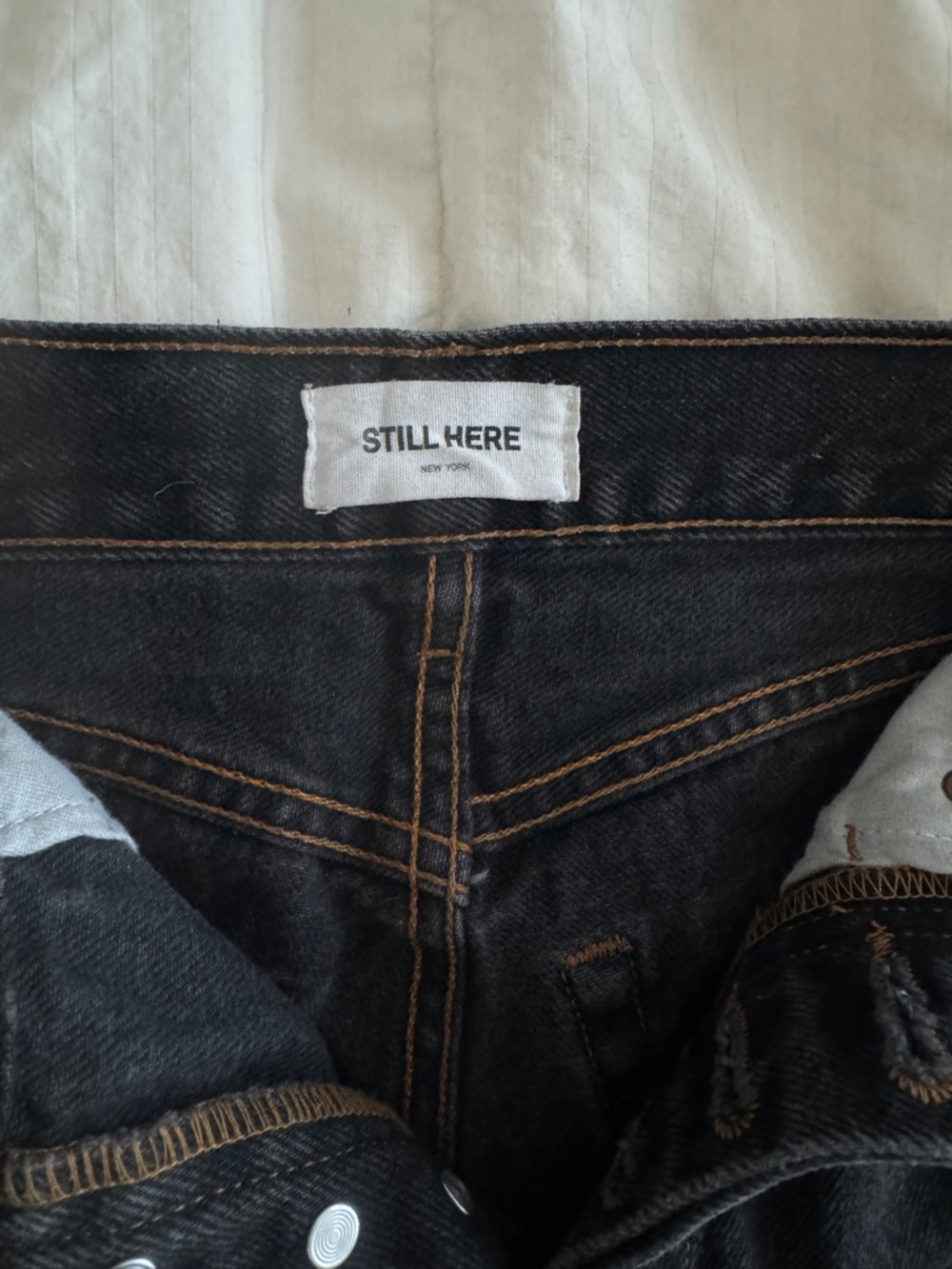 STILL HERE Women's Slim Straight Jeans in Black